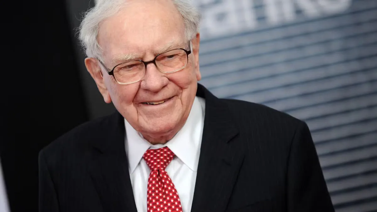 Portrait of Warren Buffett with a quote about long-term investing and patience.